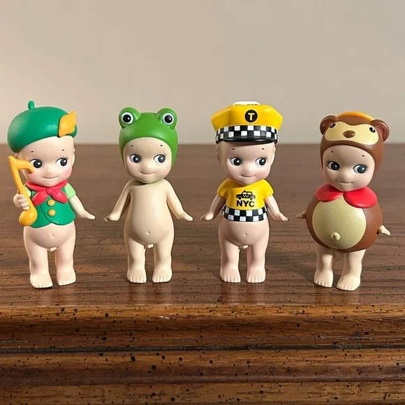 Sonny Angel Lot of 4 Sonny Town Musician, NYC Yellow Taxi Cab, Frog, Raccoon Dog - Picture 1 of 4